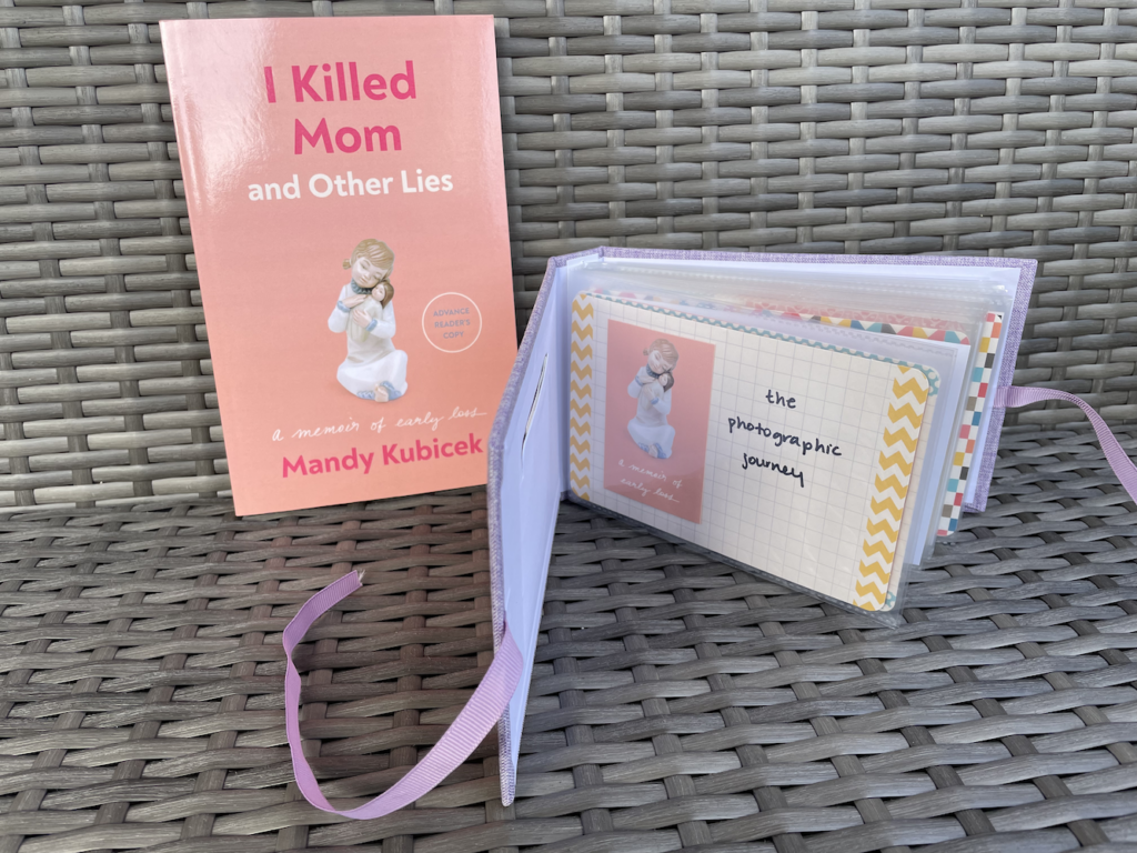 book and open photo album labeled i killed mom and other lies the photographic journey